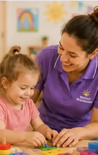 A nursery practitioner and child learning through play